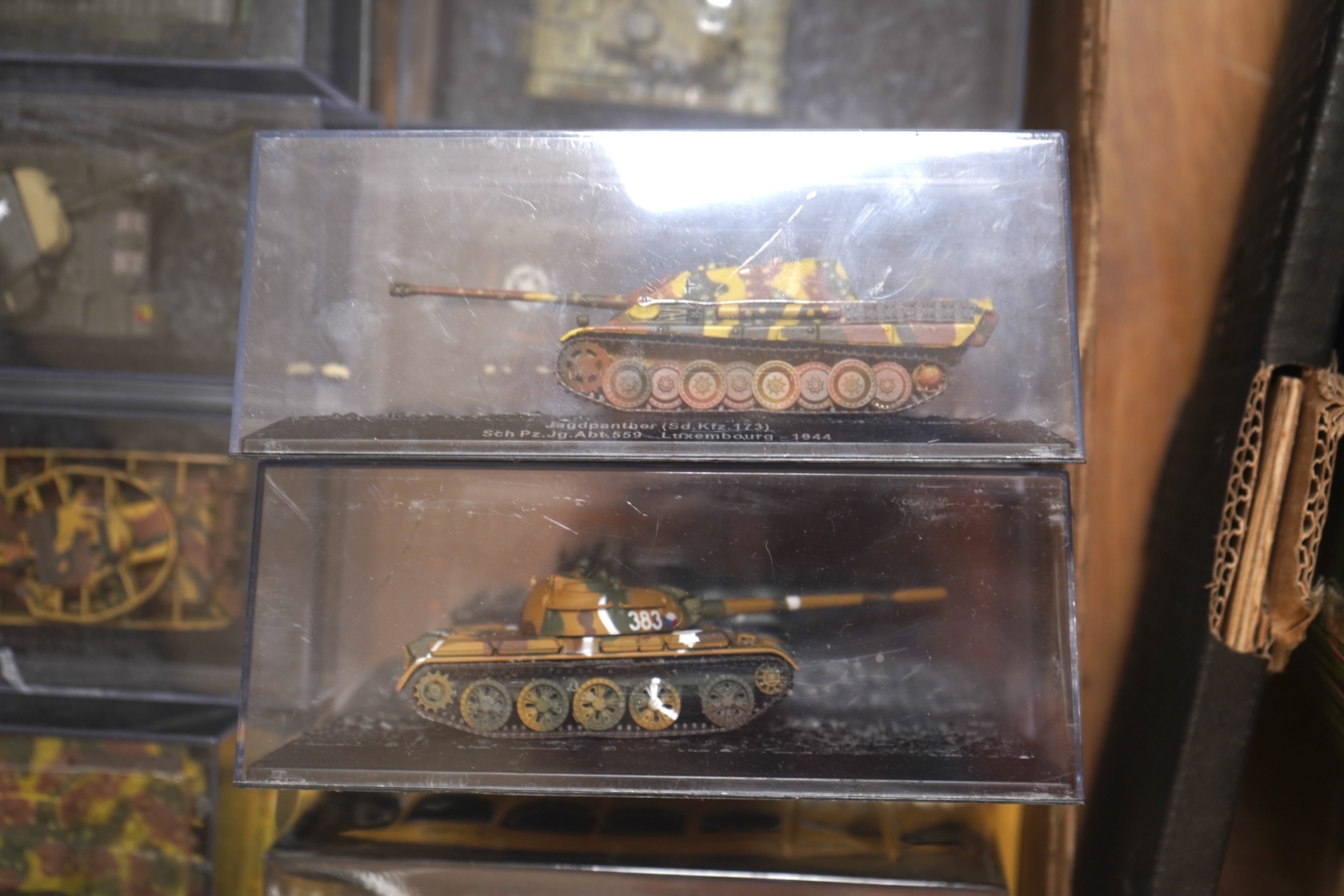 Forty-five DeAgostini magazine issue model tanks from ‘The Combat Tanks Collection’, including British, US, USSR, etc. examples, together with three folders of related magazines. Condition fair to good, all in original b